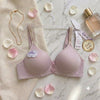 soothing mint green bra designed with sporty striped straps and a sweet floral charm for daily wear.