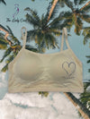 Padded Comfort Bralette
Featuring soft pastel shades, cozy padding, and an adorable heart print, this bralette is designed to keep you comfortable and stylish all day long.