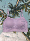 Padded Comfort Bralette
Featuring soft pastel shades, cozy padding, and an adorable heart print, this bralette is designed to keep you comfortable and stylish all day long.
