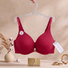 Premium textured ribbed fabric
«delicate
gold- tone center charm, supportive contoured cups, and comfortable adjustable straps.