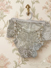 Intricate floral lace paired with side-tie detailing for the ultimate feminine charm a ( Pack OFF Three )