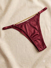 Elevate your essentials with this luxe satin and gold-chain detailed thong. ( Pack Of Four )