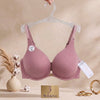 Premium textured ribbed fabric
«delicate
gold- tone center charm, supportive contoured cups, and comfortable adjustable straps.