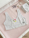 Ribbed texture featuring a cute bicycle graphic on the side and a striped elastic underband
Features: Breathable stretch fabric, comfortable wide straps (tank style), and a gentle, secure fit ideal for daily wear.( Pack Of 2 )